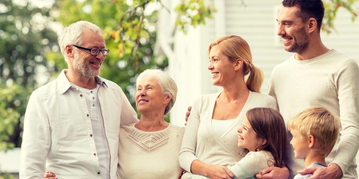happy family in front of house outdoors CAN I USE FAMILY AS A GUARANTEE?